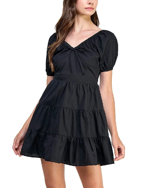 Save More Than Ever!Koko + Mason Puff Sleeve Mini Dress
